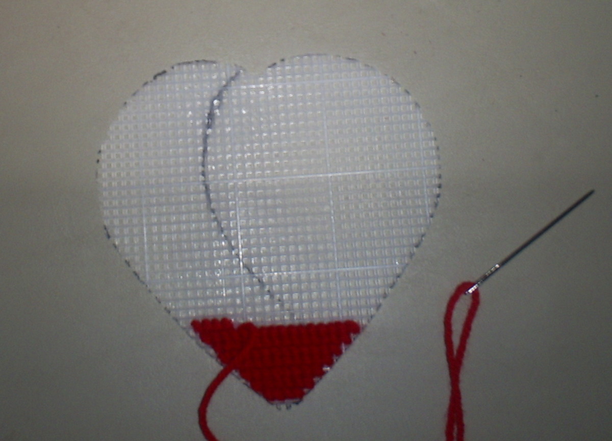Continue cross stitching up the heart.  