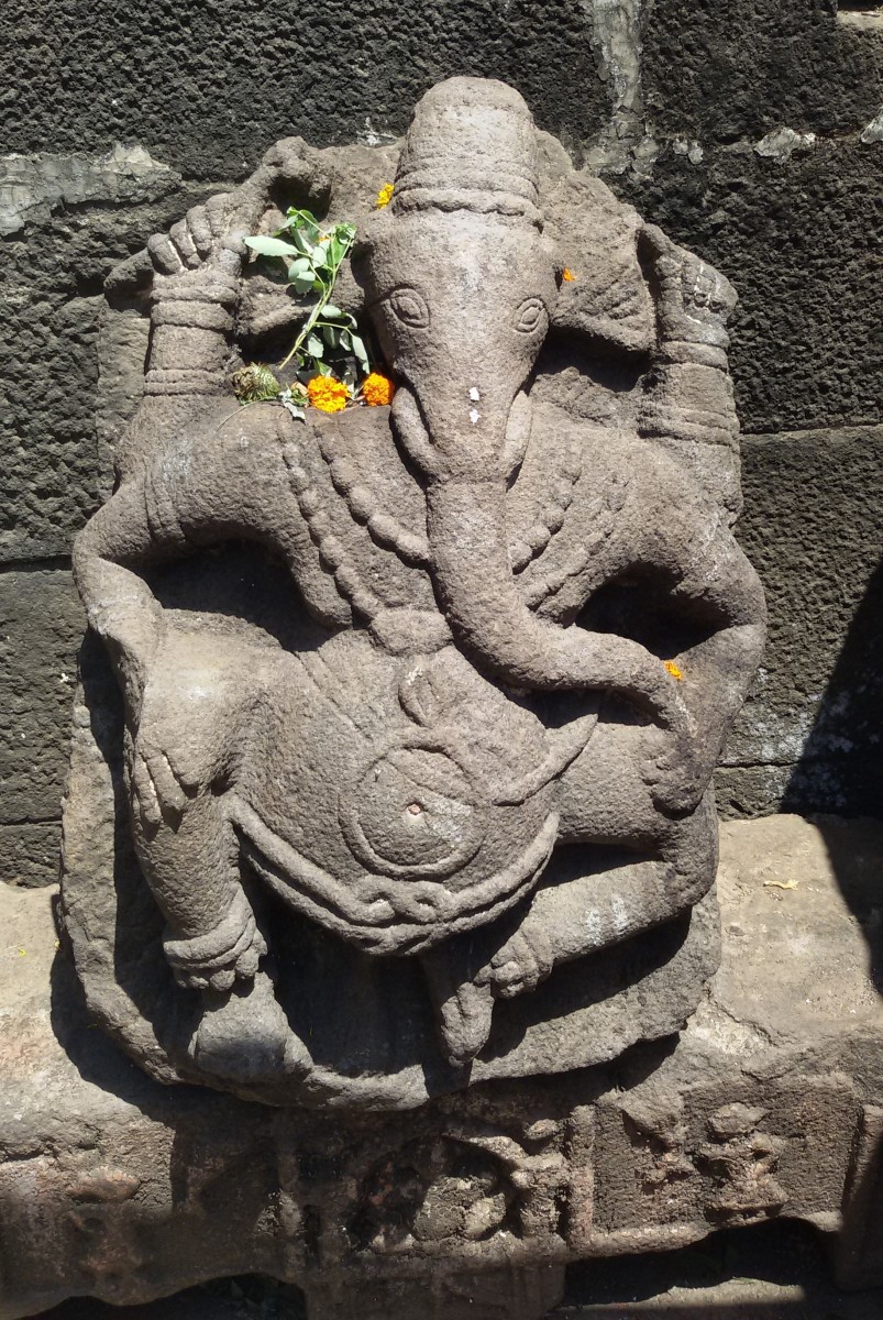 Ganesh idol made of stone; trunk towards left; Bhimashankar, Maharashtra