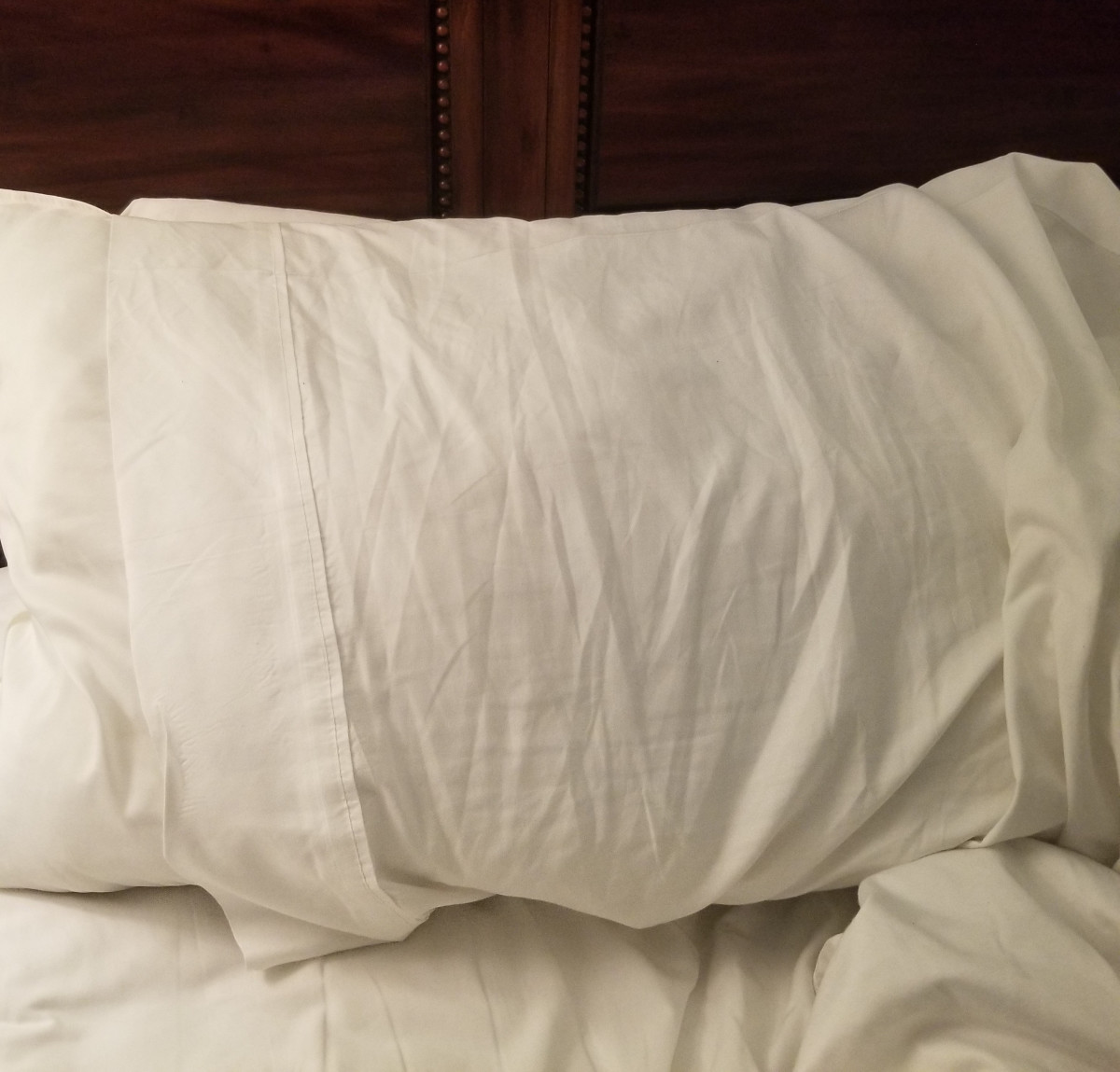A pillow can enhance your comfort when you sleep. 
