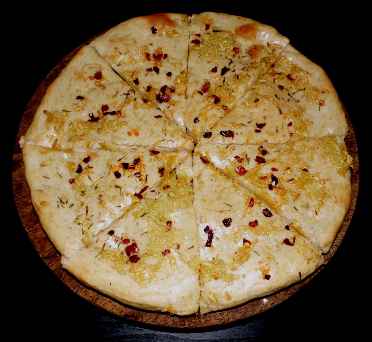 Garlic bread with chilli flakes and oregano