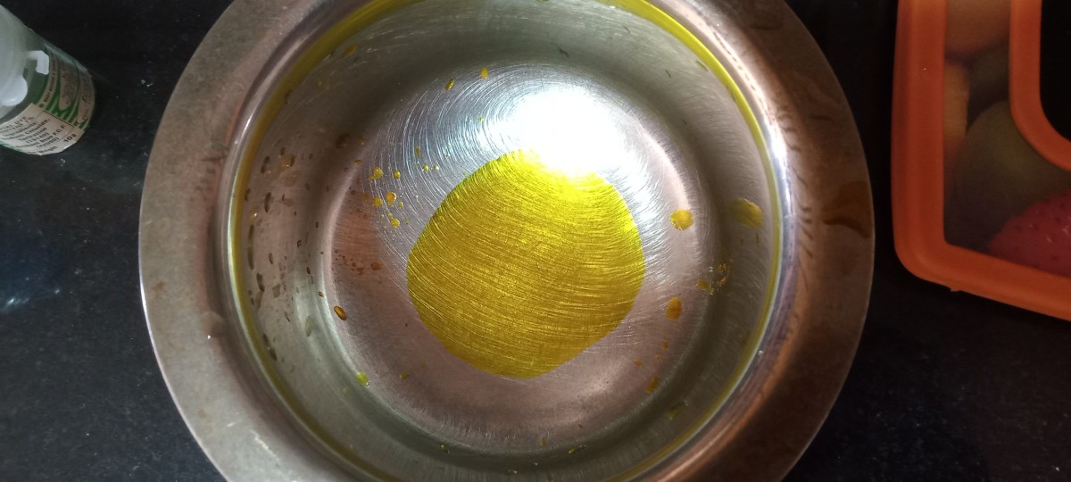 Dissolve food colour in some water.