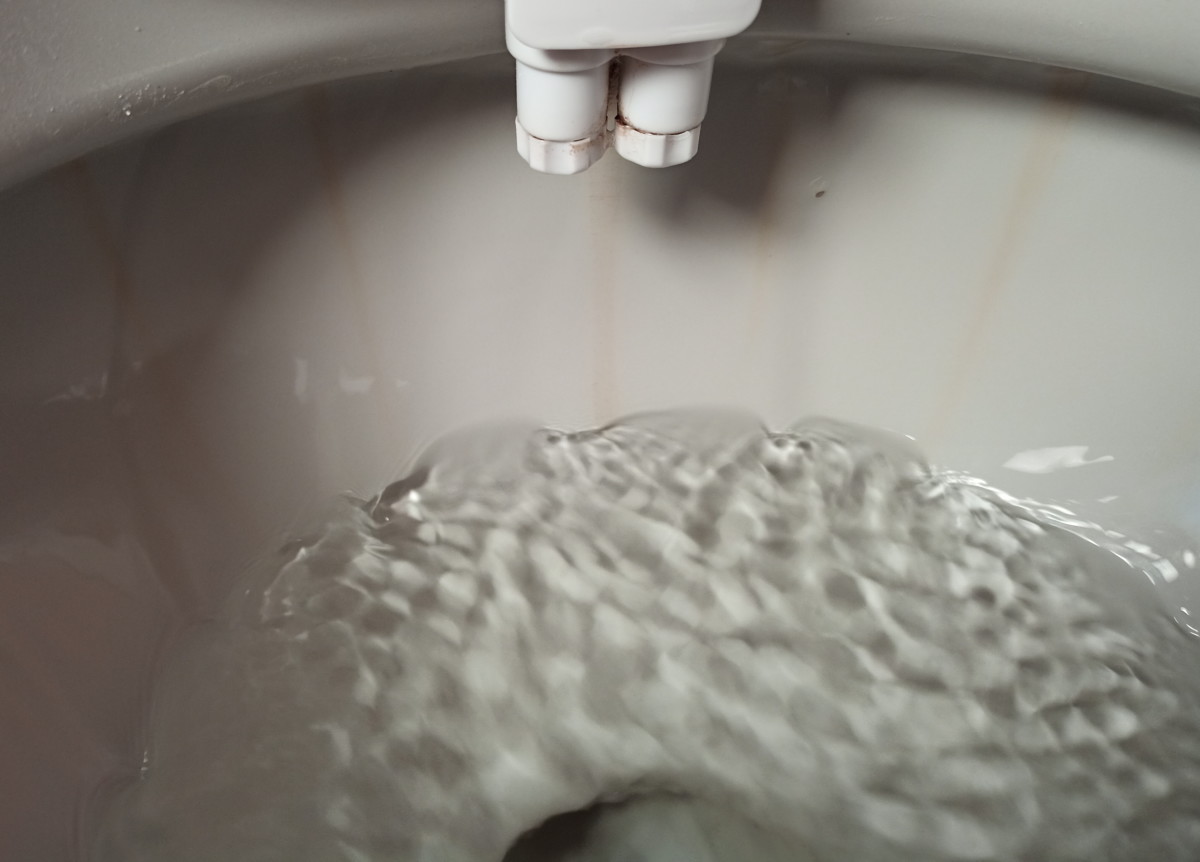 Toilet basin after being scrubbed