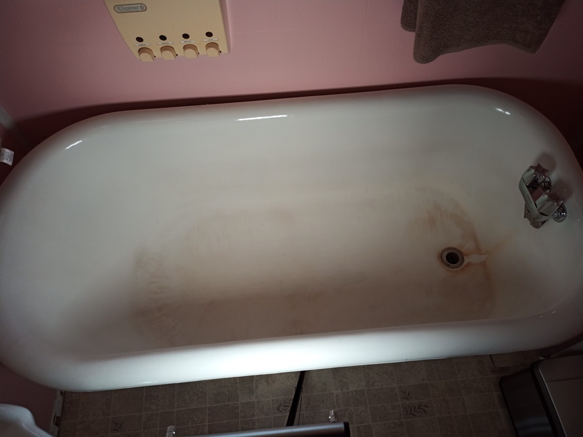 Bathtub before being scrubbed