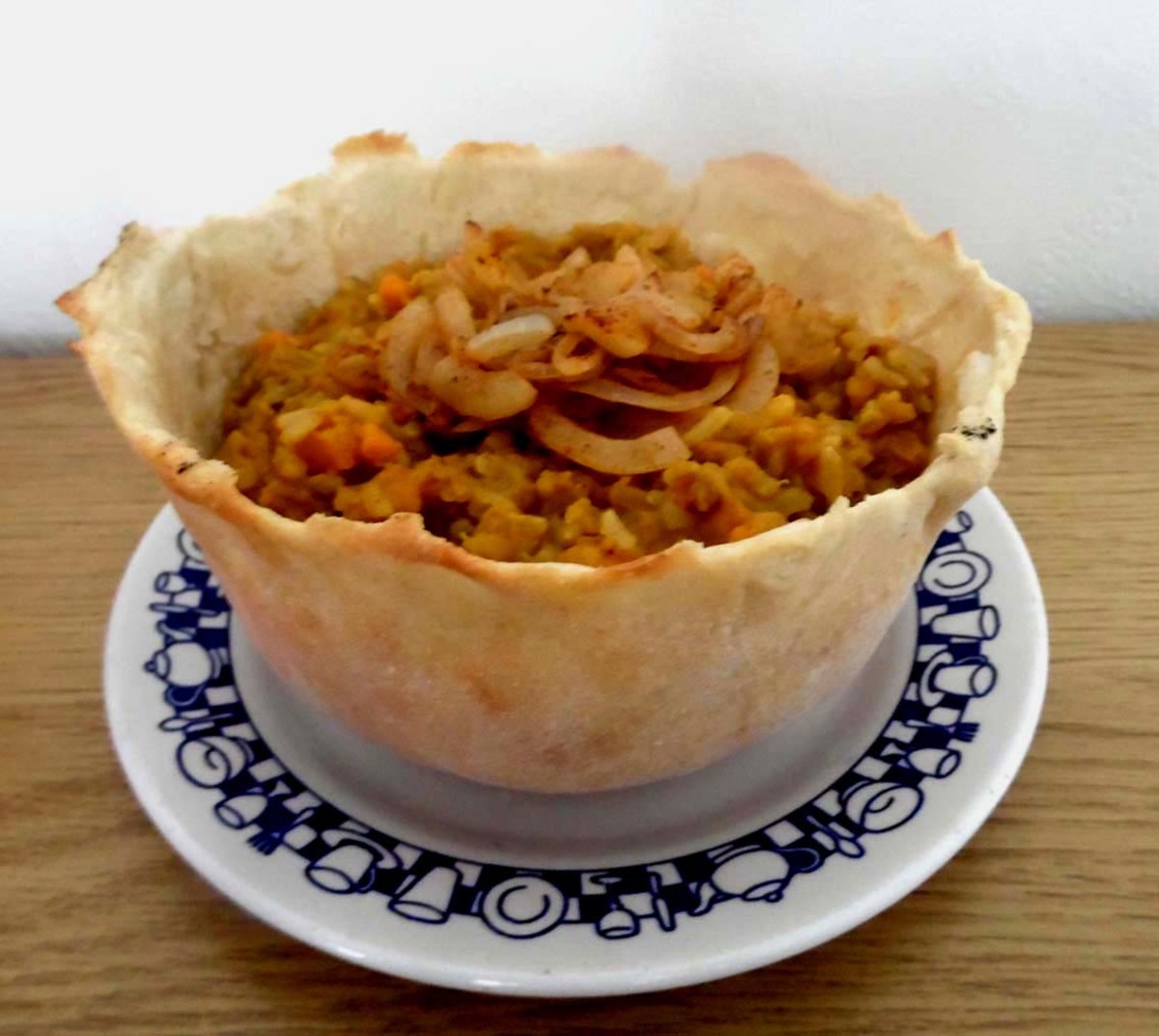 Vegan Khichdi With Onion Sambal Served in a Bread Bowl