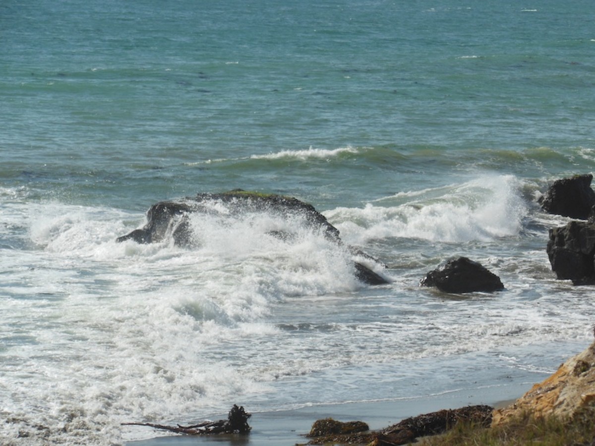 Waves crashing on rocks.