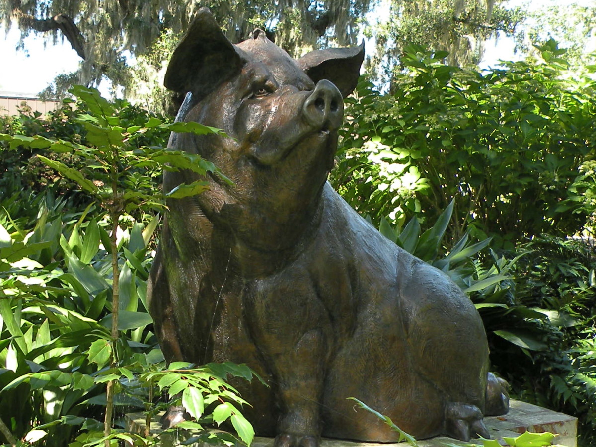 Eat More Beef - bronze sculpture by Sandy Scott.