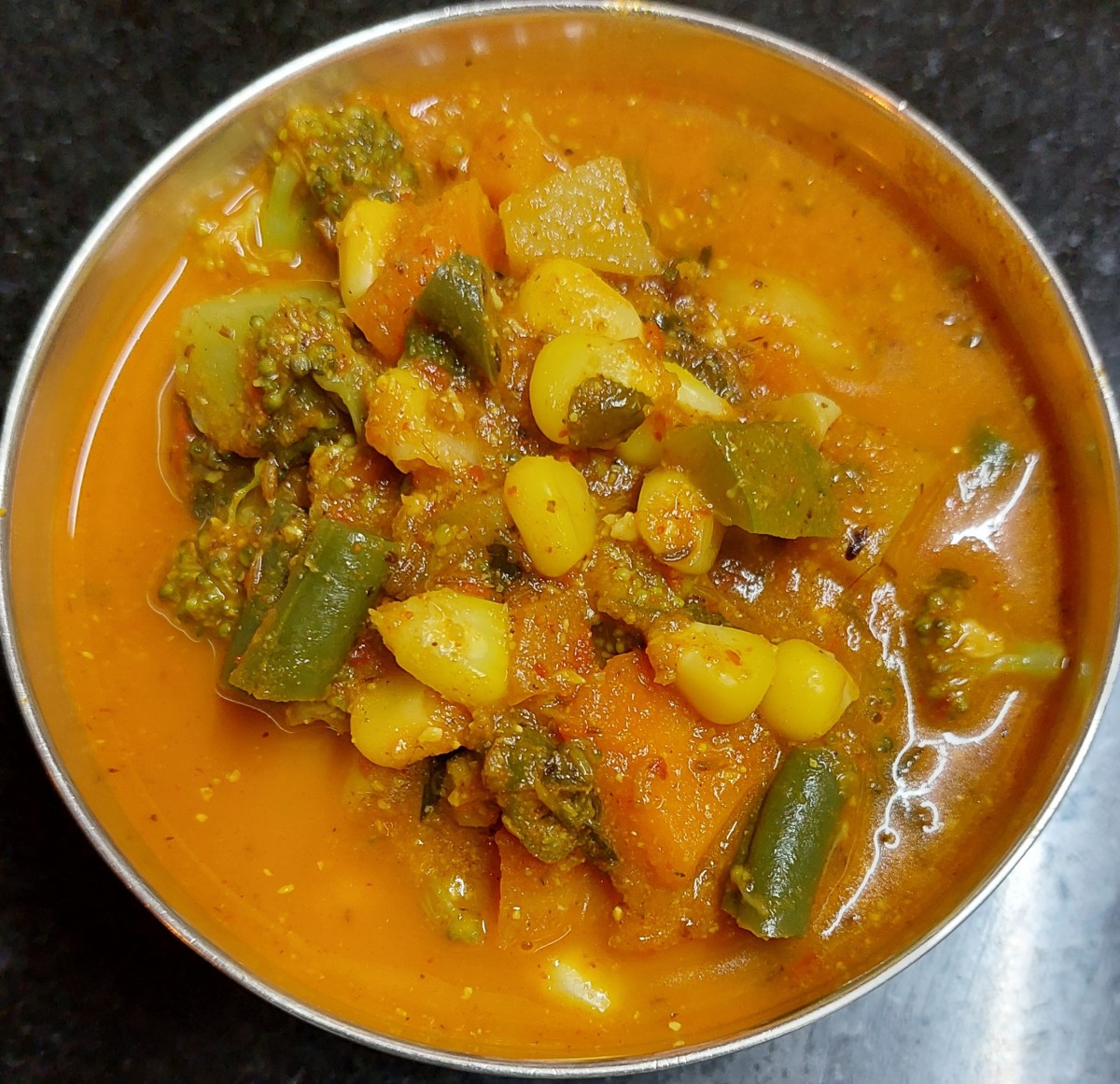 Serve hot with chapati, roti, poori or paratha.