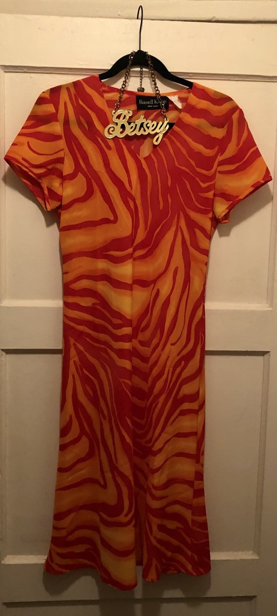 Orange and yellow swirl print dress by Russell Kemp New York