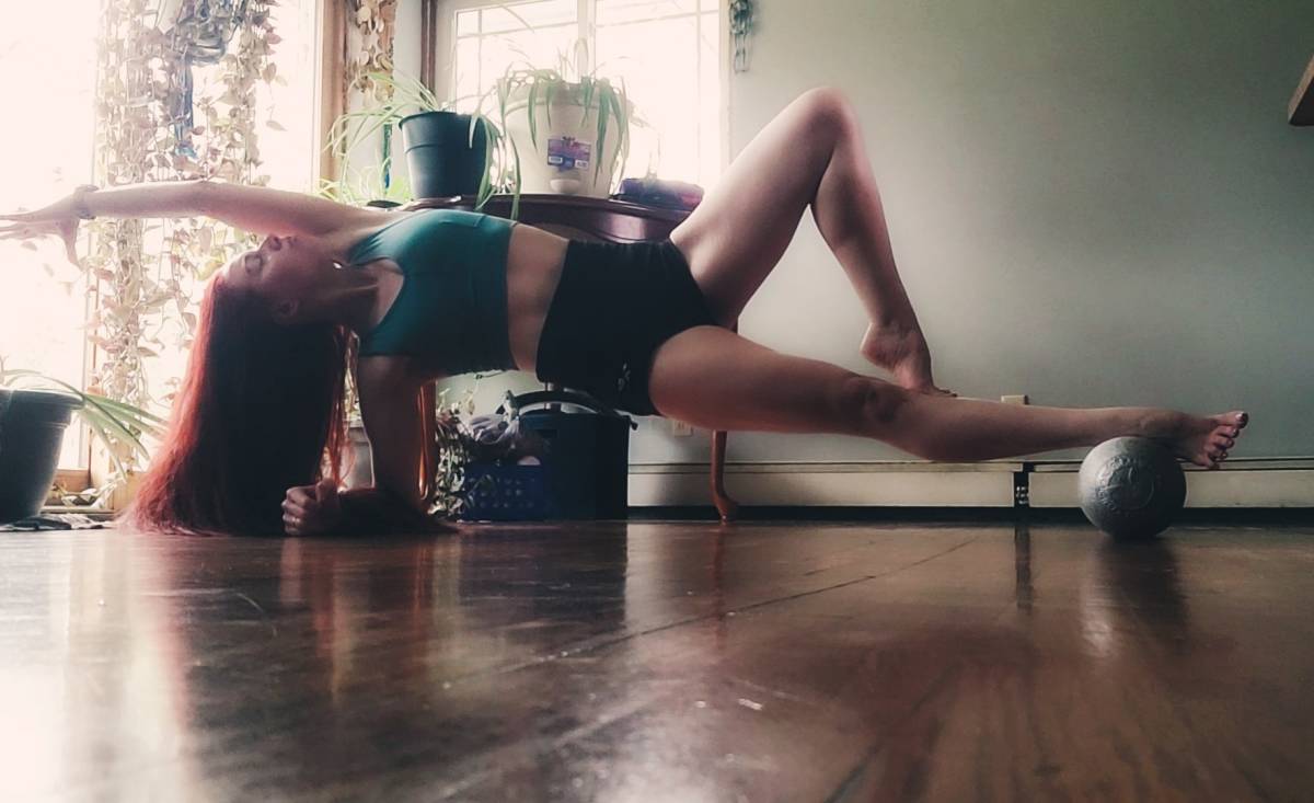 A forearm side plank using a prop.