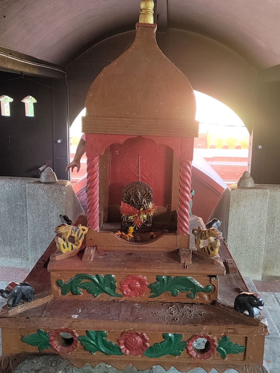 Durga idol on a wooden pedestal in the ante-chamber; Dirgheshwari