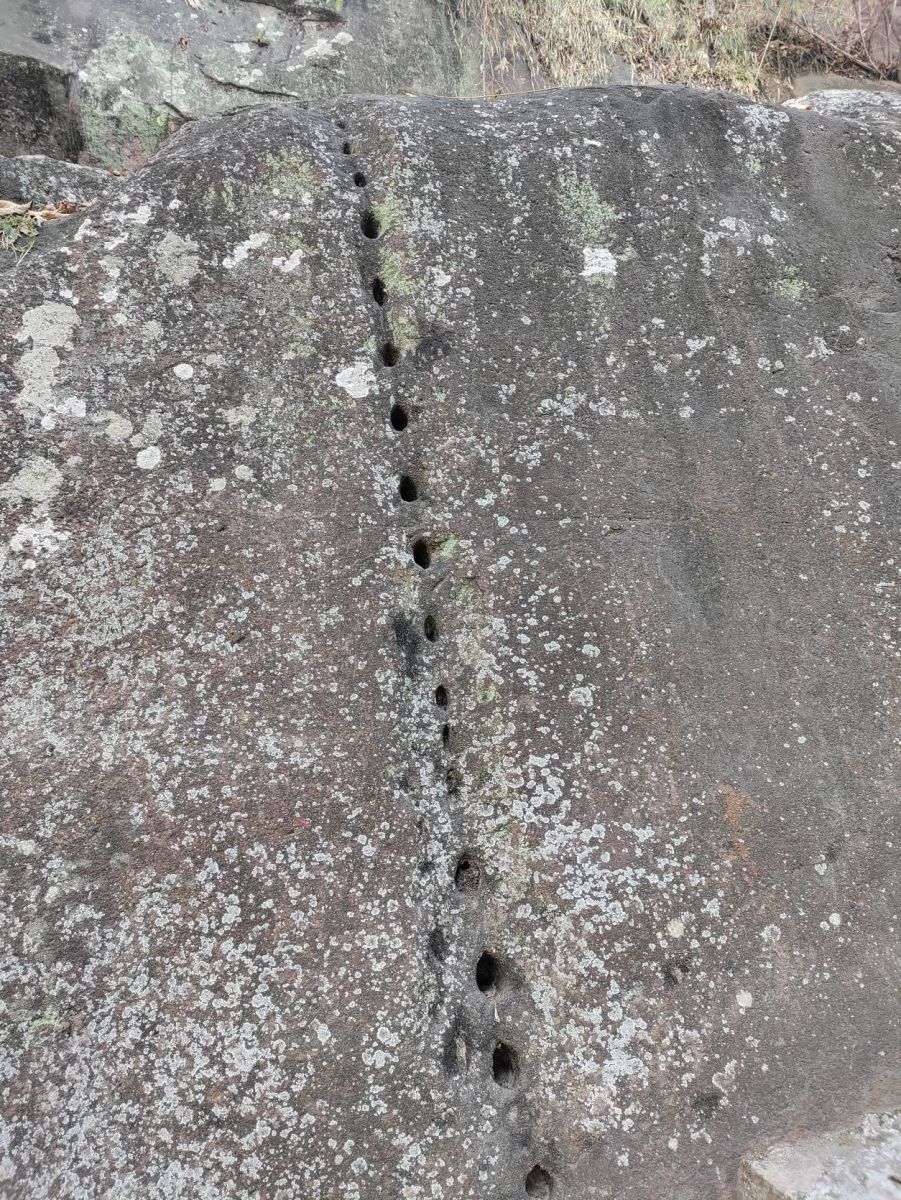 Linear box like holes in a rock; Sitachal Hill