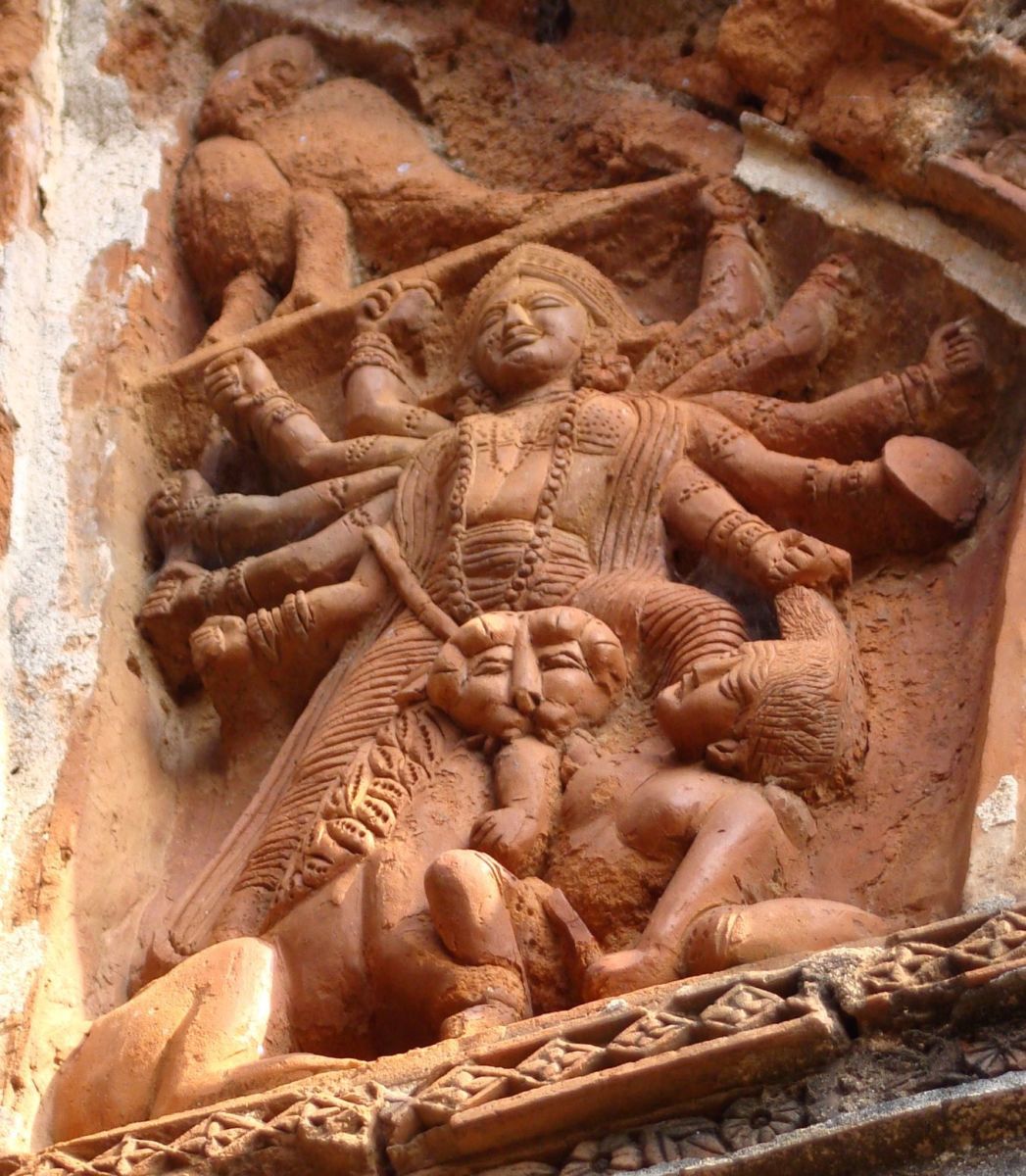 The usual picturization of Goddess Durga riding a lion; terracotta;  Shiva temple, Bankati village, District Paschim Bardhaman, West Bengal