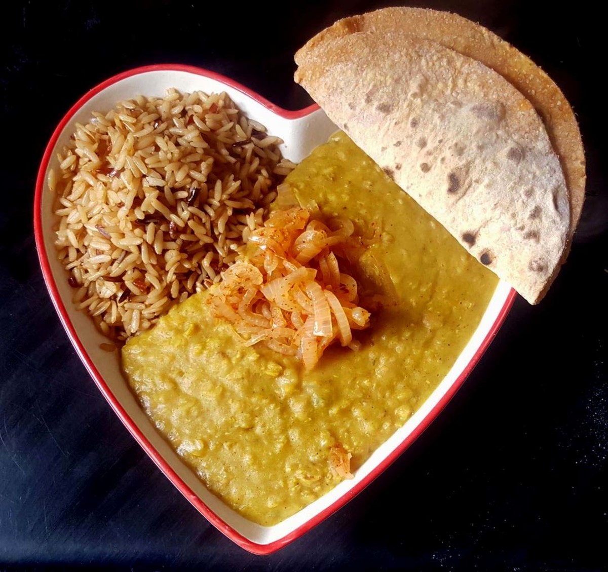 My evening meal might be lentil curry with brown rice, onion sambal and sweet potato roti