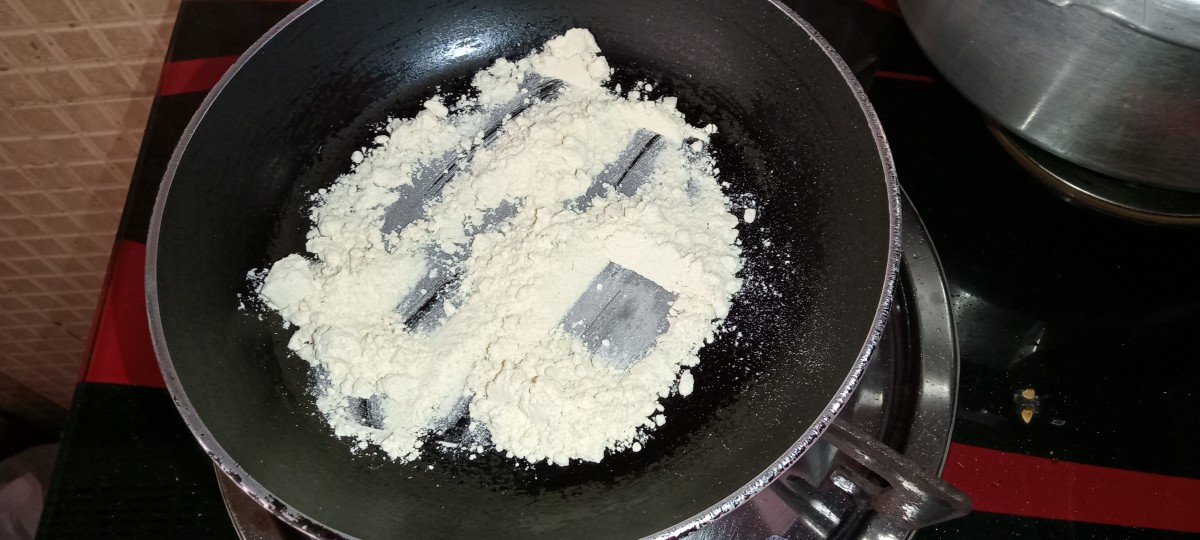 Roast besan (gram flour) in a pan for 2 minutes. Set aside.