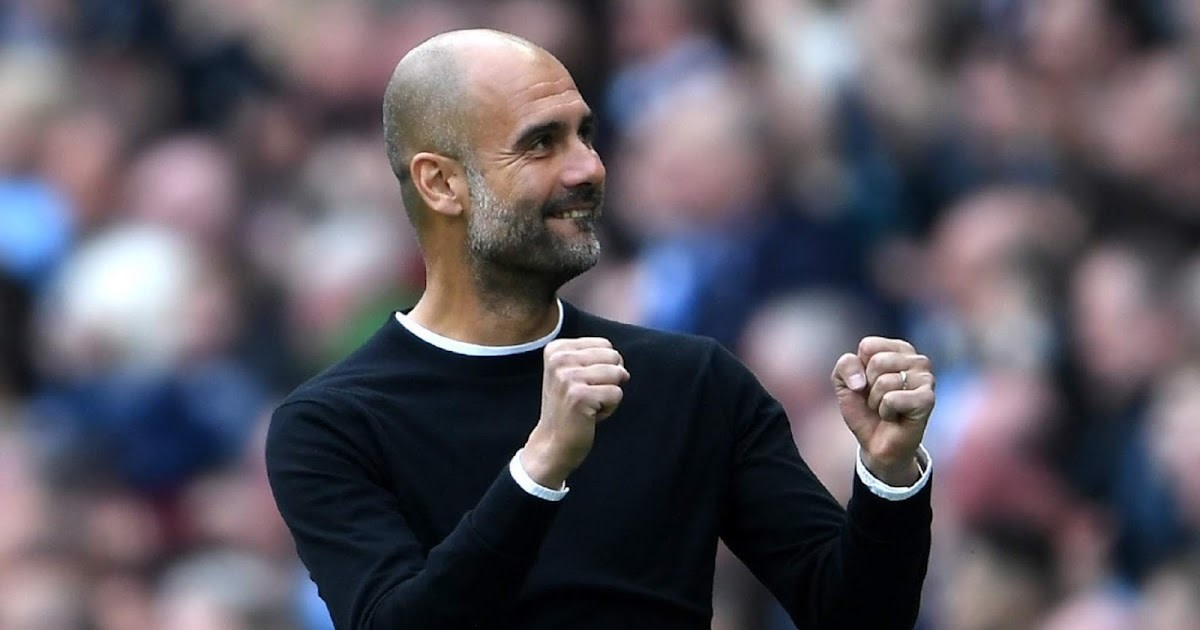 Manchester City Manager Pep Guardiola celebrating a win. 