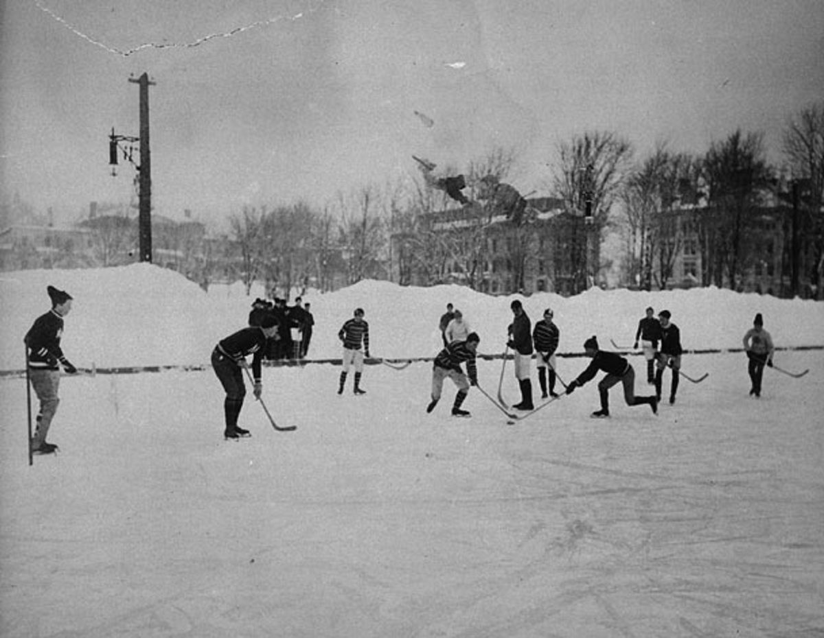 Photo of an outdoor 1901 hockey game taken place at McGill University in Montreal.