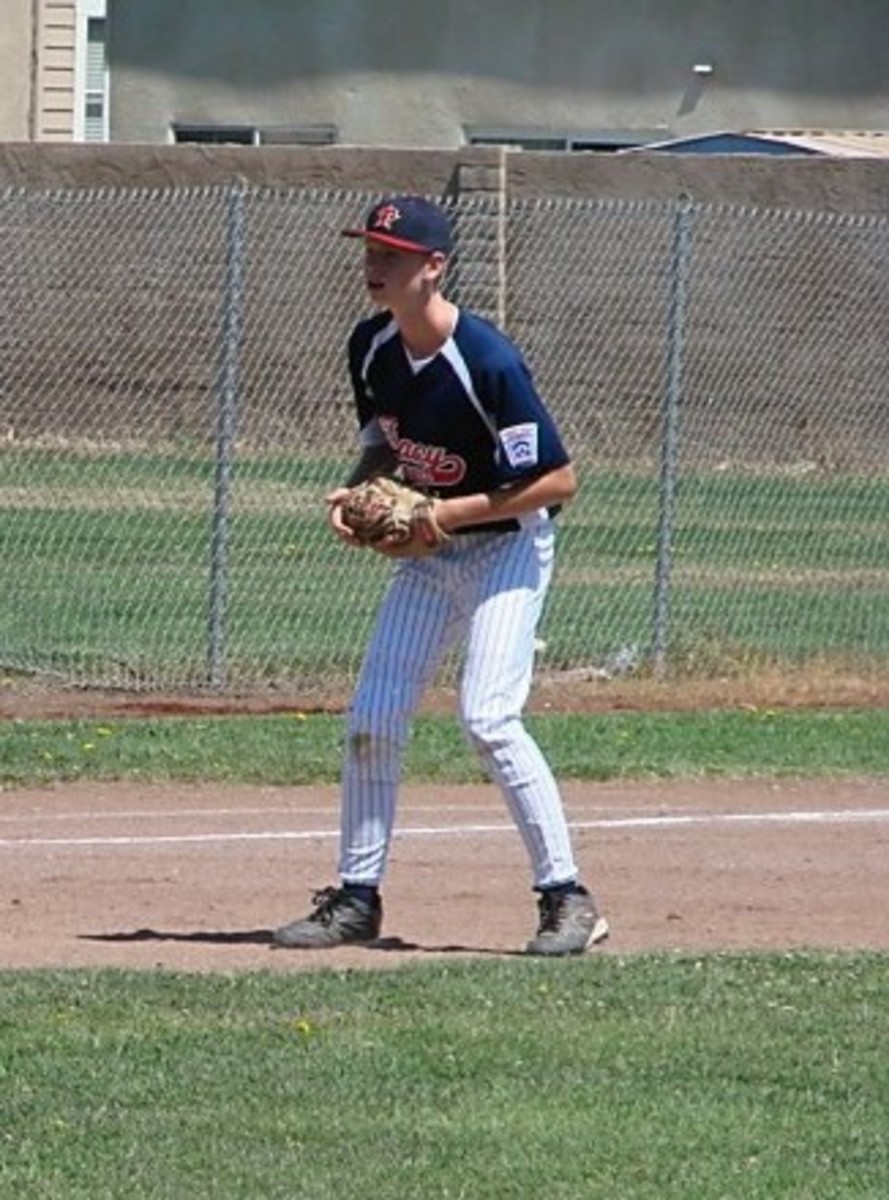 Our son playing third base in our local All Star tournament July 2011.