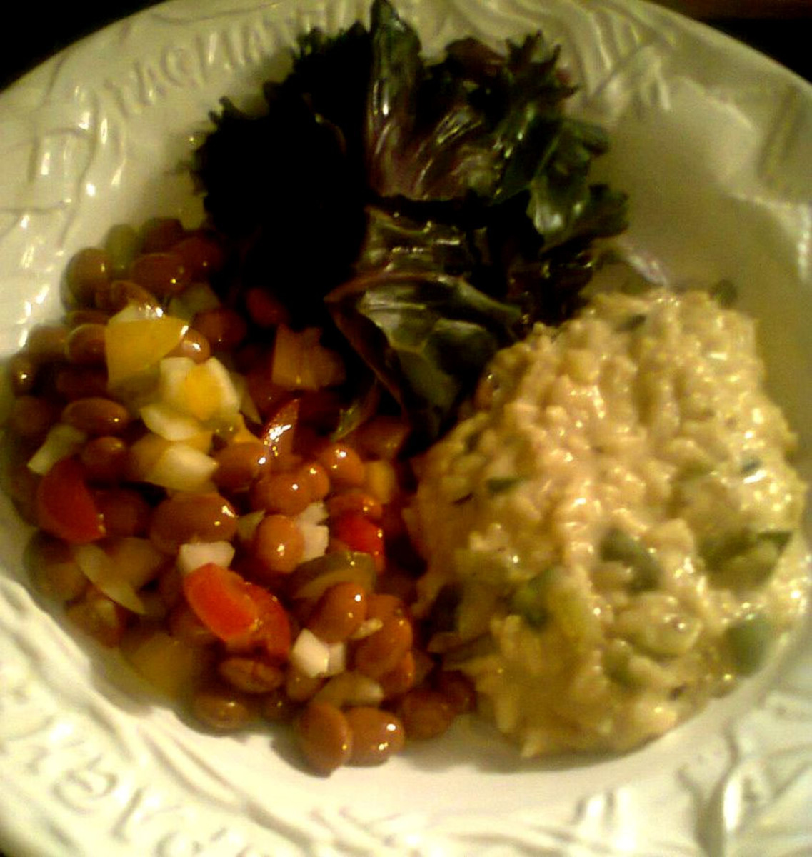 Creamy vegetable risotto, borlotti bean salad, and steamed buttonhole kale 
