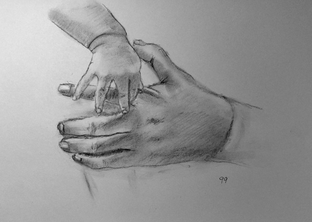 Drawing hands exercise in charcoal.