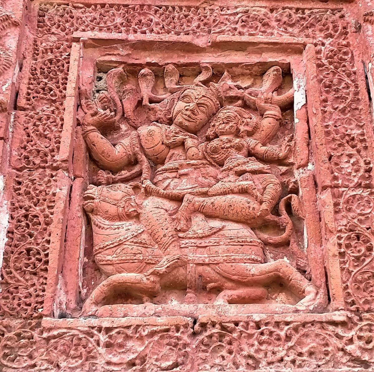 Lord Shiva with His coinsort Goddess Parvati on Nandi the Bull; terracotta; Raghunath Shiva temple; Ghurisha, Birbhum, West Bengal