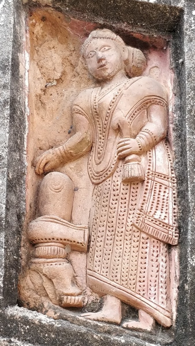 A lady worshiping a Shiva linga; terracotta; Jaipur, Bankura, West Bengal