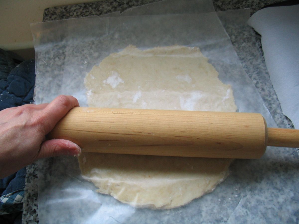After dough is chilled, take out one of the sections and roll it out to approximately 1/8-inch thick.