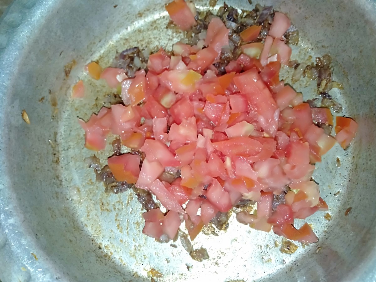 Add chopped tomato.