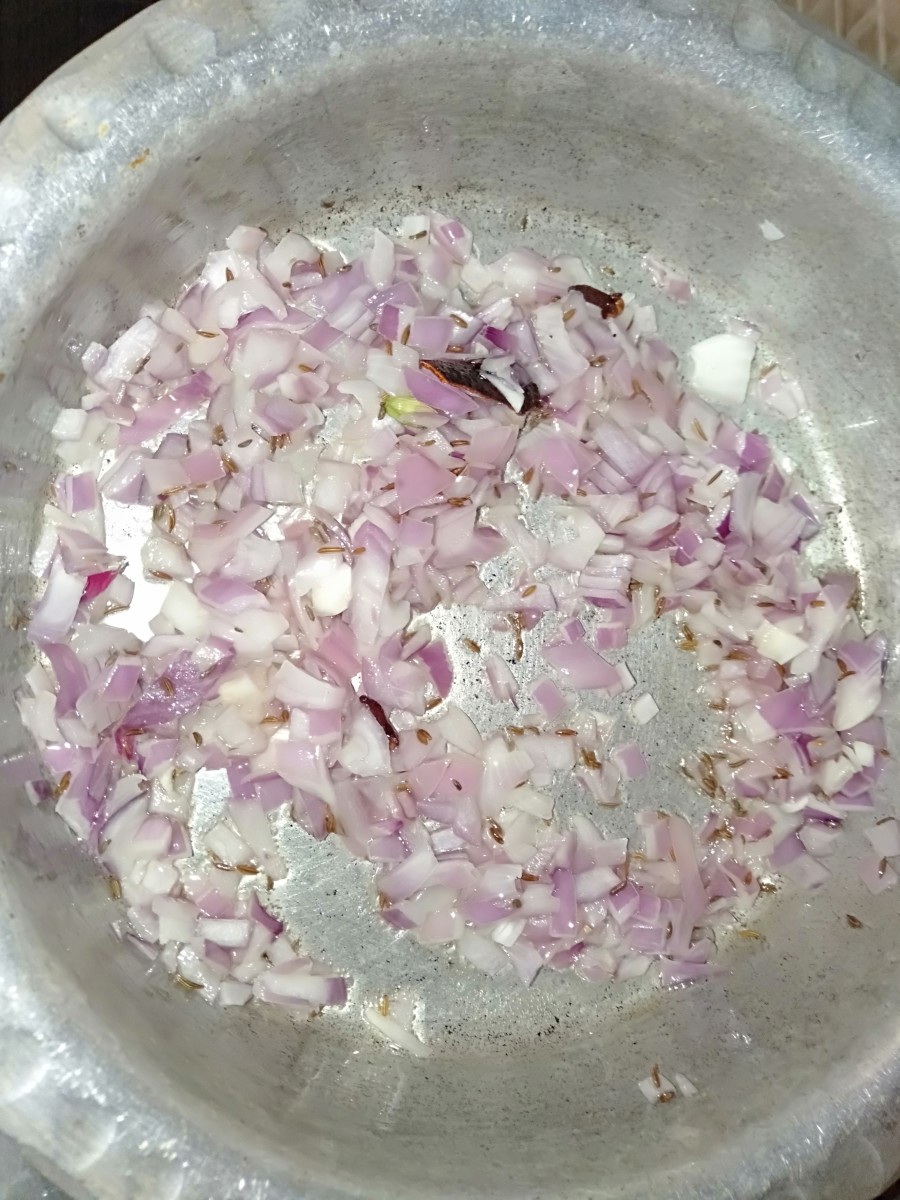 Add chopped onion and sauté until golden brown.