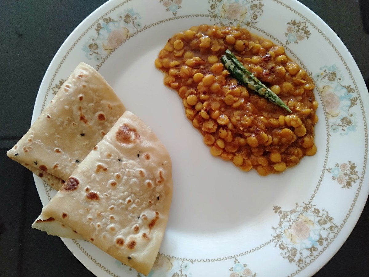Healthy split chickpea lentil curry served with roti