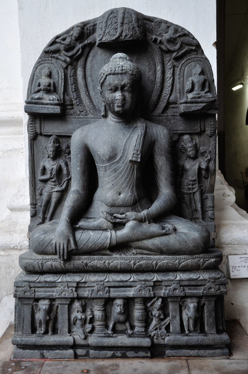 A buddha portraying the Bhumisparsha Mudra hand gesture. This statue is at the archeology gallery of Indian Museum, Kolkata.