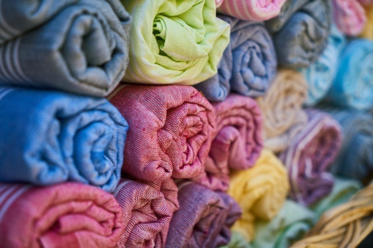 Keep your towels that are still thick and soft. The rest can be tossed away. 