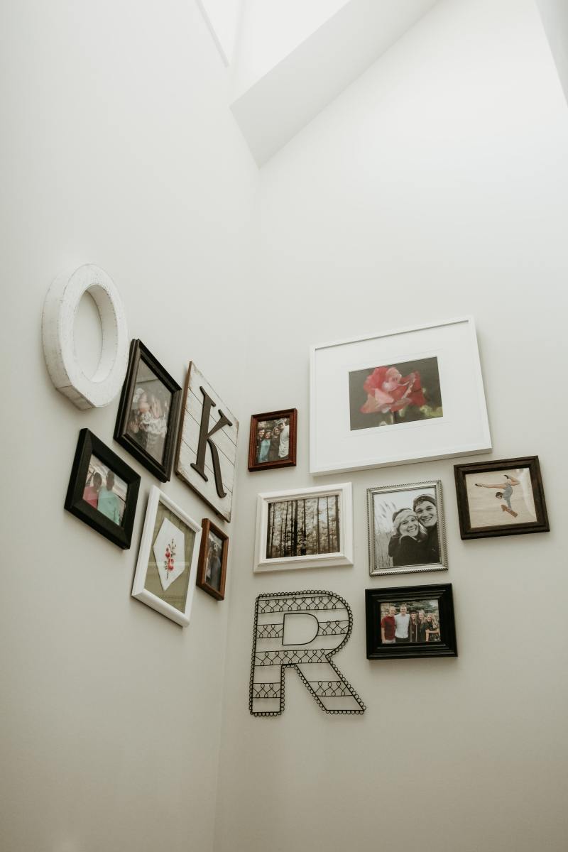 Plan your arrangement before hanging wall art.
