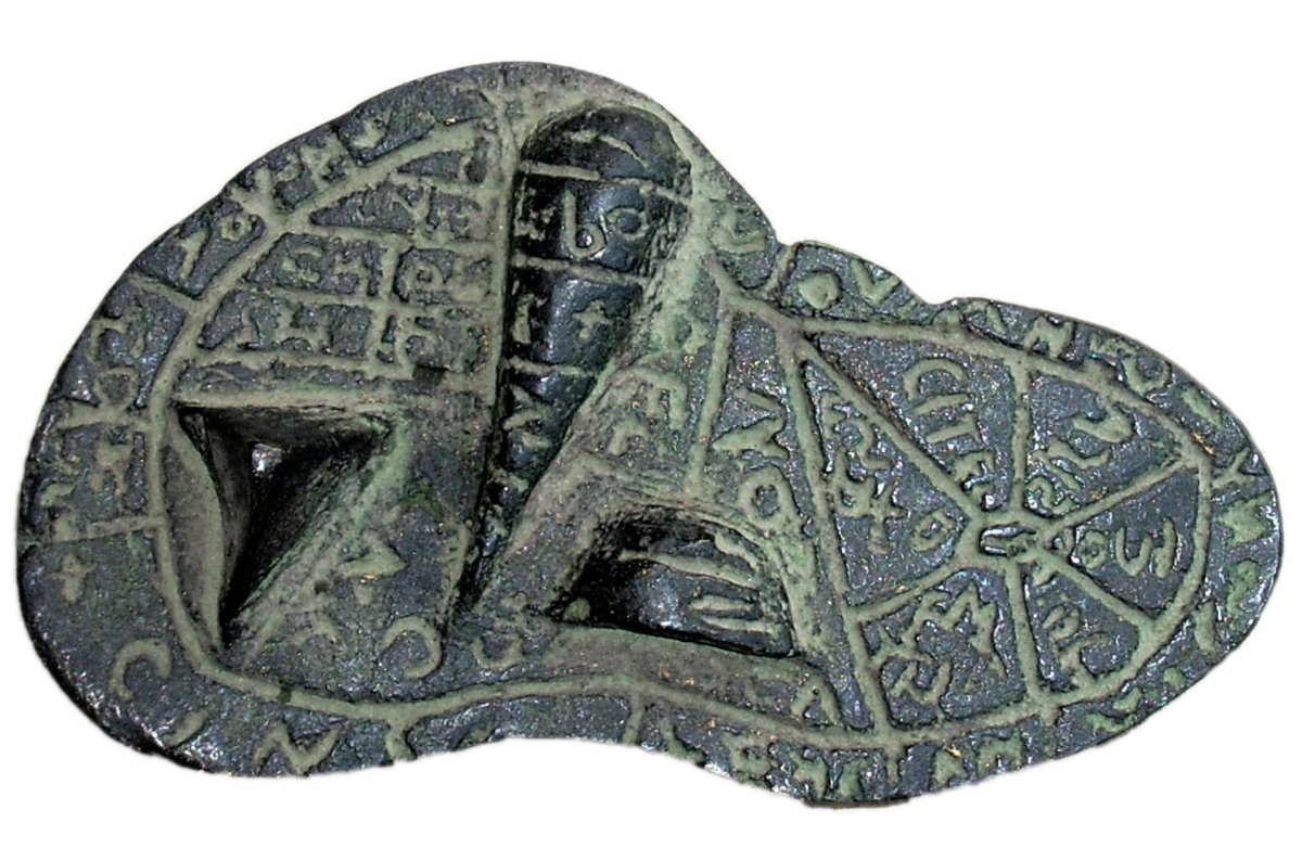 The Liver of Piacenza, with a diagram and Etruscan inscriptions from the second century BC. The bronze model is about the size of a sheep’s liver with the names of 28 Etruscan deities. The outer rim is divided into 16 regions.