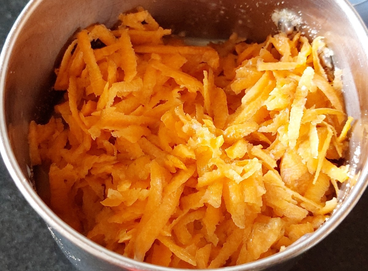 To the same jar, add the grated carrot.