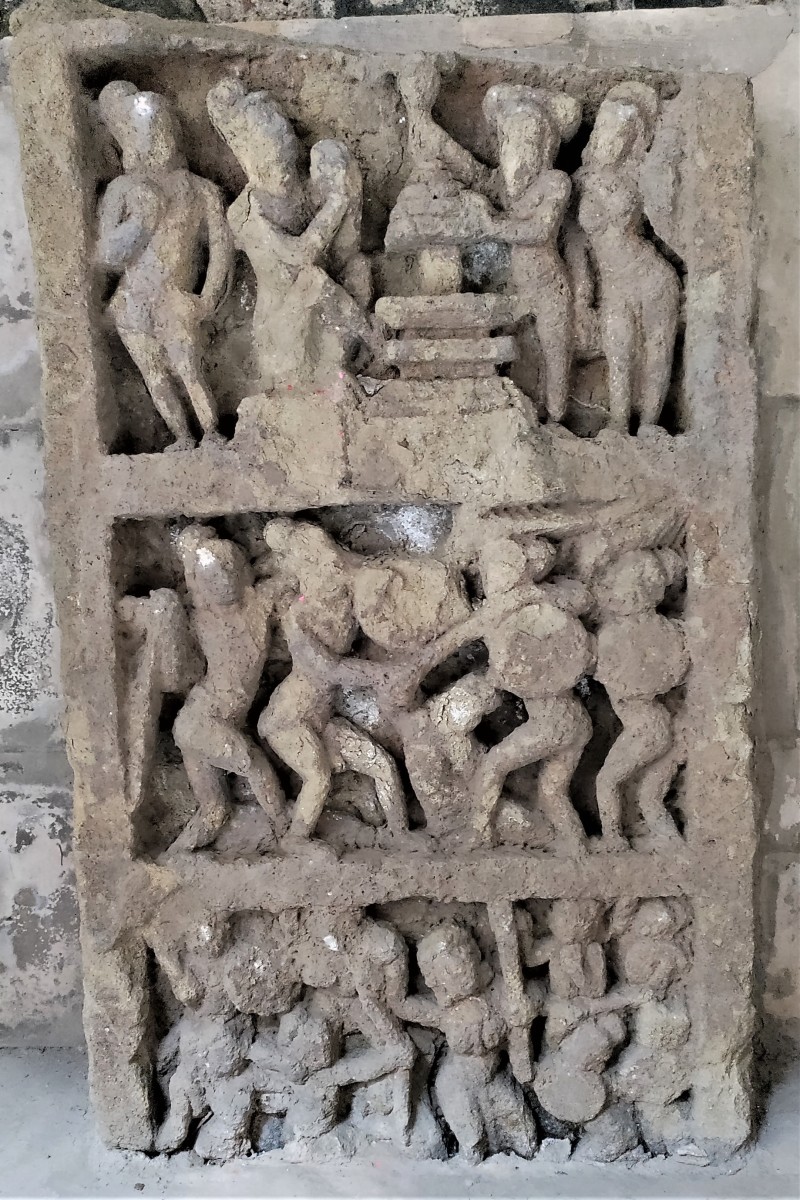 Stone panel with multiple figures