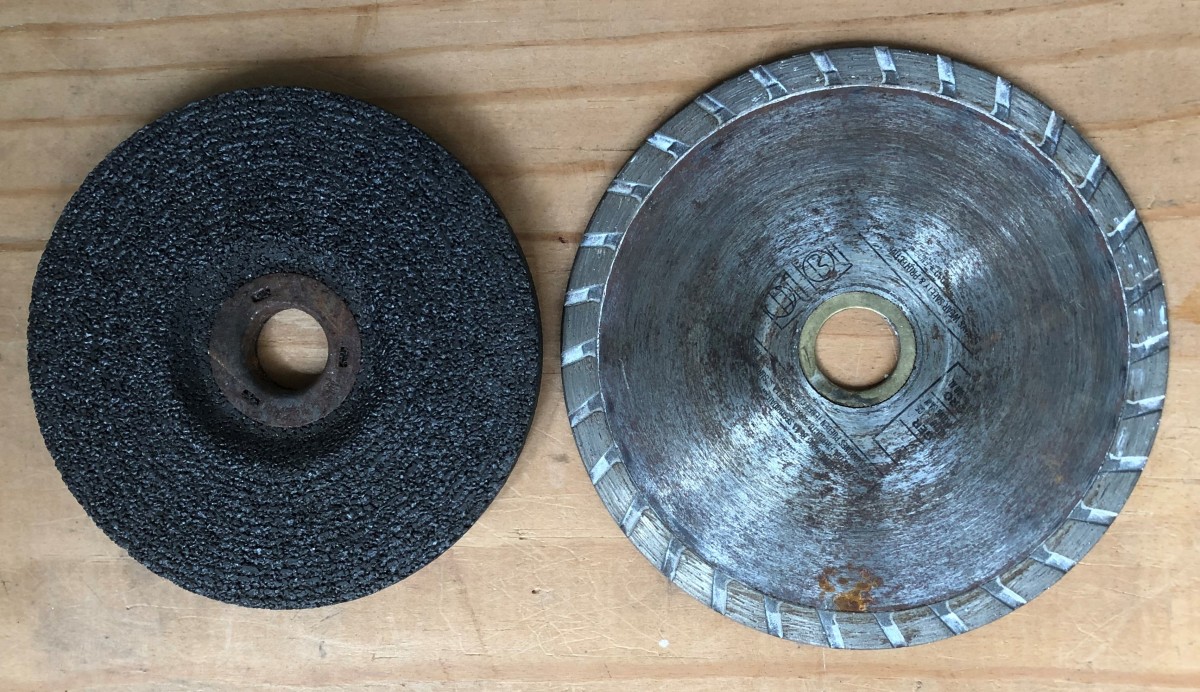 The metal grinding wheel on the left works great at knocking rust off a piece of iron. Unfortunately it will not cut tile like the diamond-studded masonry blade on the right will.