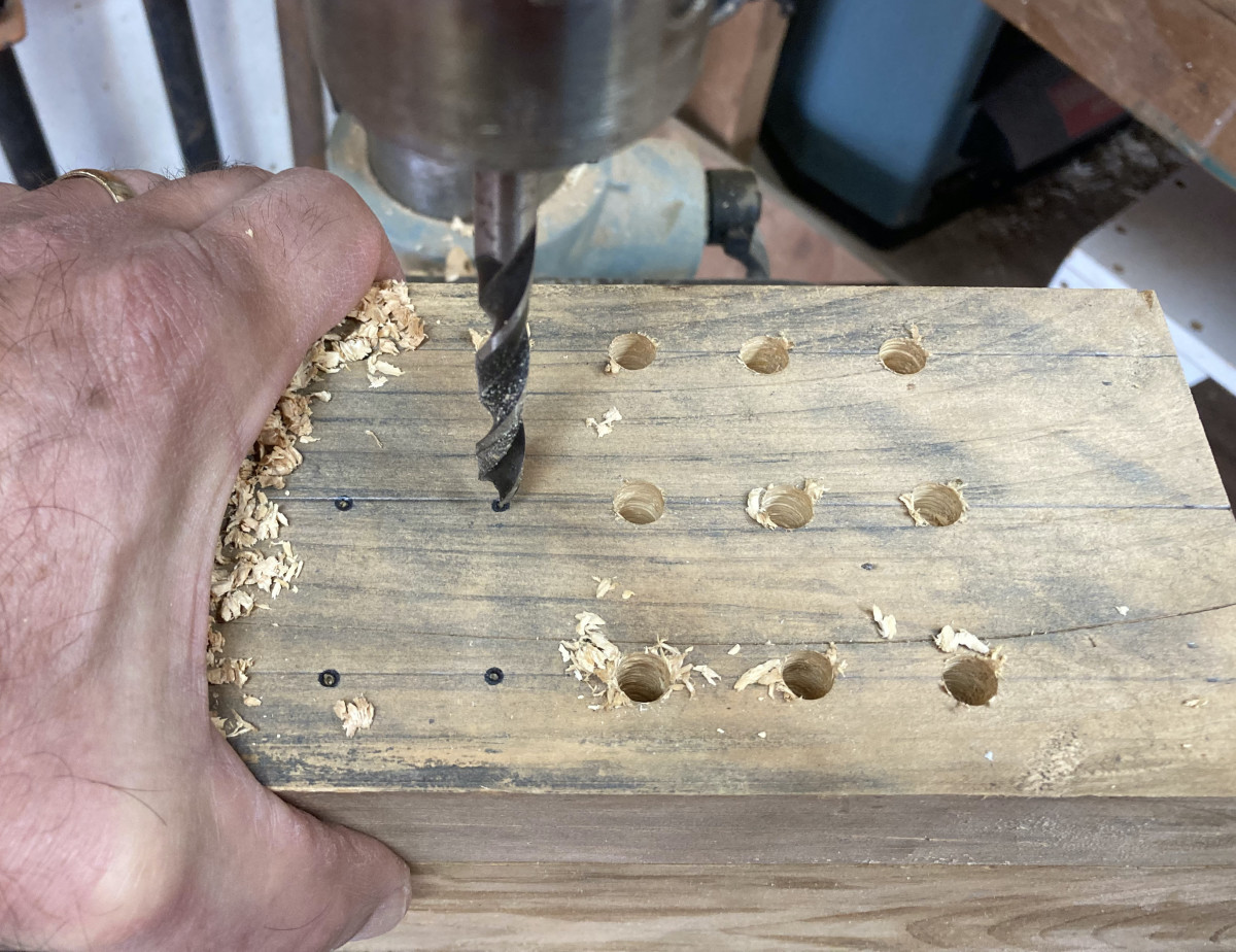 A drill press makes it easy to bore out the holes 