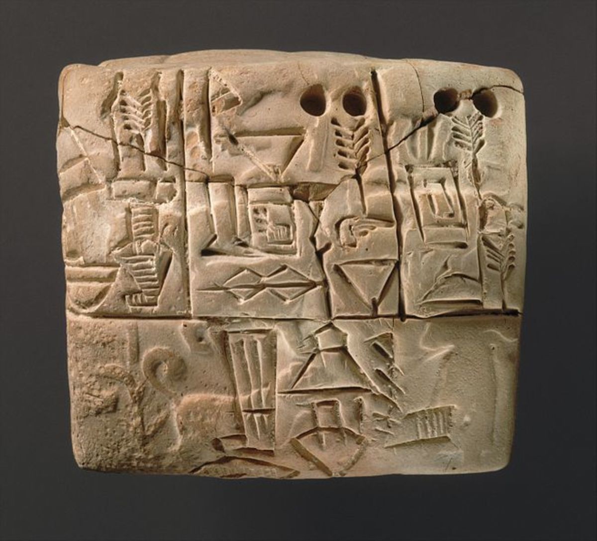 A Sumerian cuneiform tablet dated back to around 3000 BC. It is believed to be an administrative account of barley distribution.
