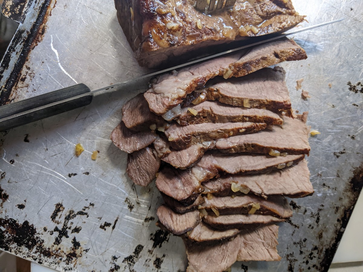 roast-beef-cooking-with-imbedded-garlic-cloves