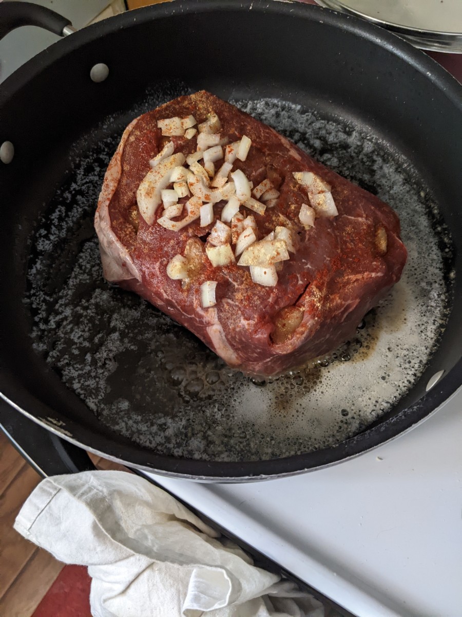 roast-beef-cooking-with-imbedded-garlic-cloves
