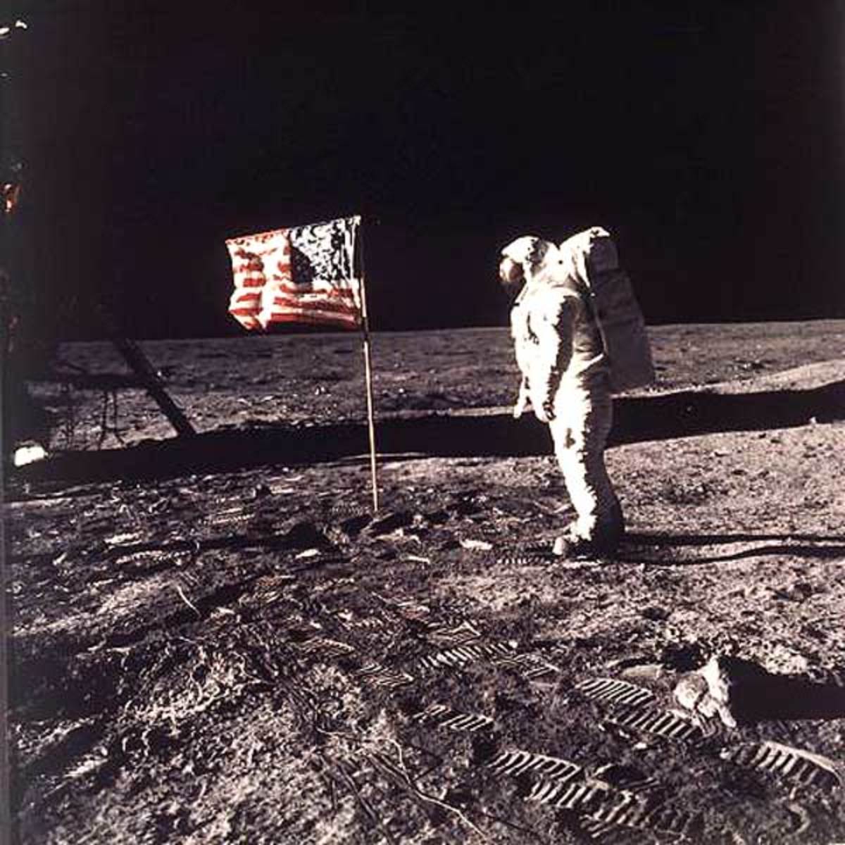 AMERICAN FLAG PLANTED ON THE MOON BY BUZZ ALDRIN