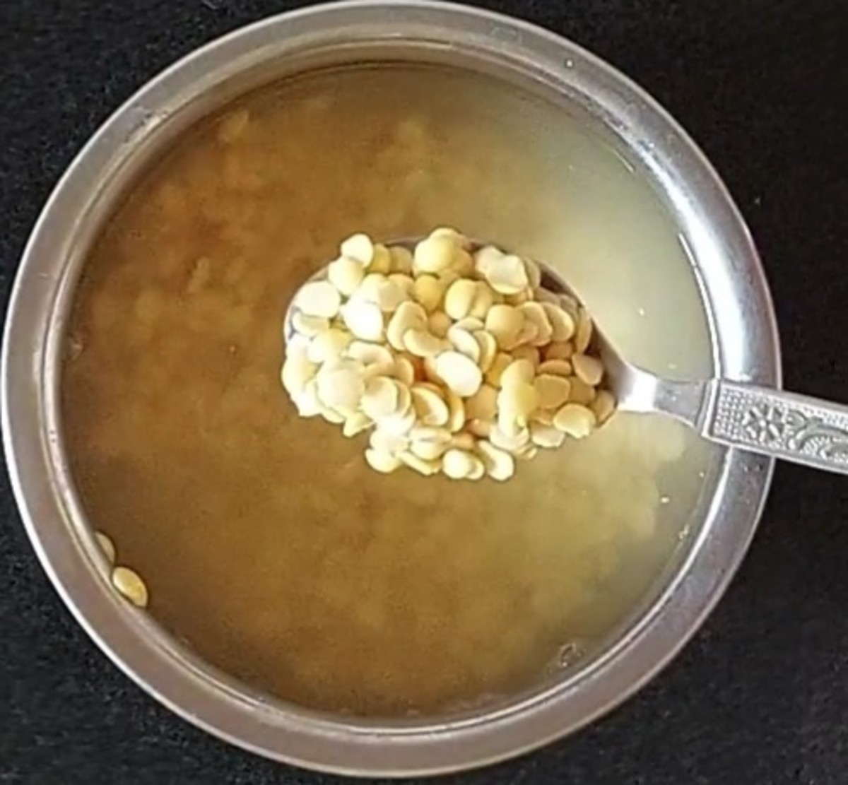 Soak 1/2 cup of toor dal (pigeon pea lentils) for 30 minutes.