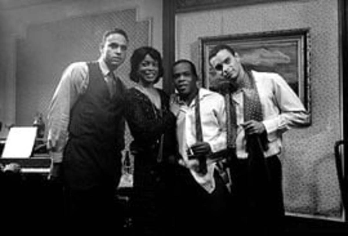 Langston Hughes (Daniel Sunjata) Zora (Aunjaneu Ellis) Wally (Ray Ford) and Bruce celebrate their magazine Fire!!