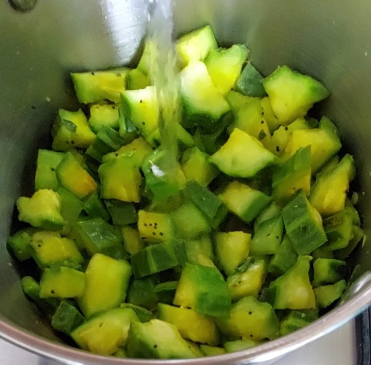 Add 1/2 cup of water, close the lid and cook till ridge gourd is cooked well.