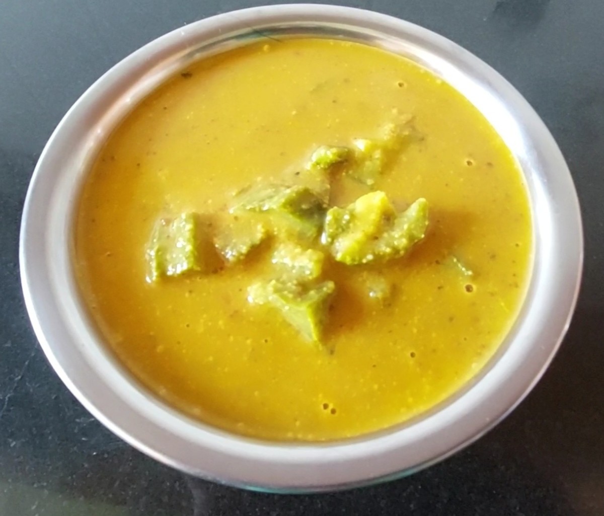 Tasty and healthy ridge gourd curry is ready to serve.