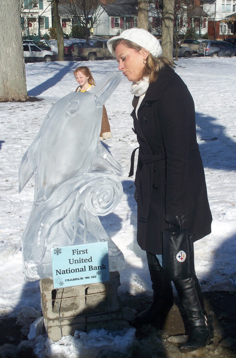 The author shares some love with an ice dolphin sponsored by First United National Bank.