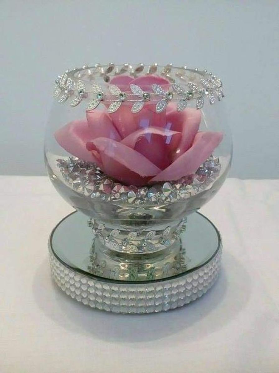 Show off a perfect faux rose in a blingy jar.