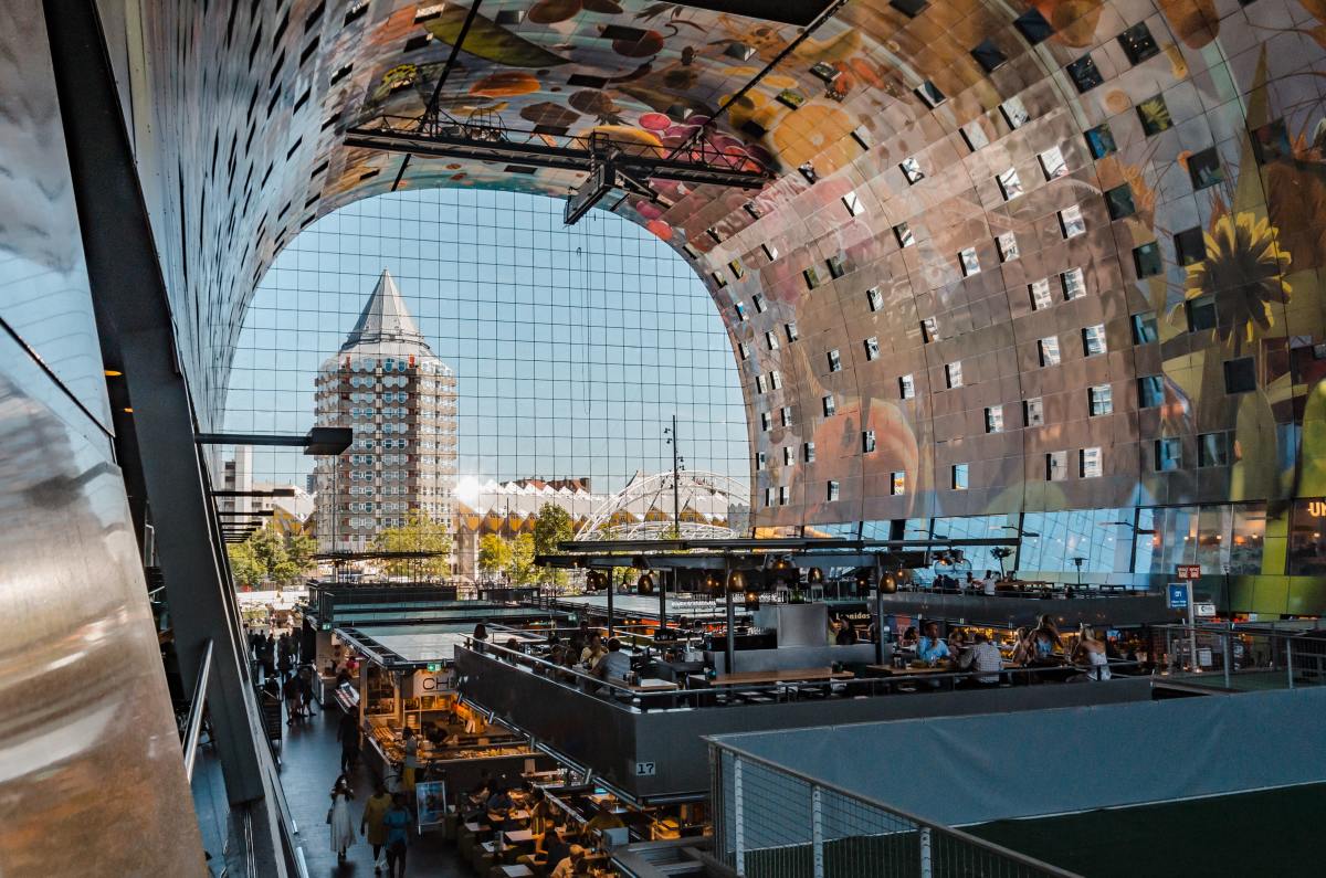 The Foodhallen in Rotterdam is an indoor food market with many different dining options that your character could grab a bite from.