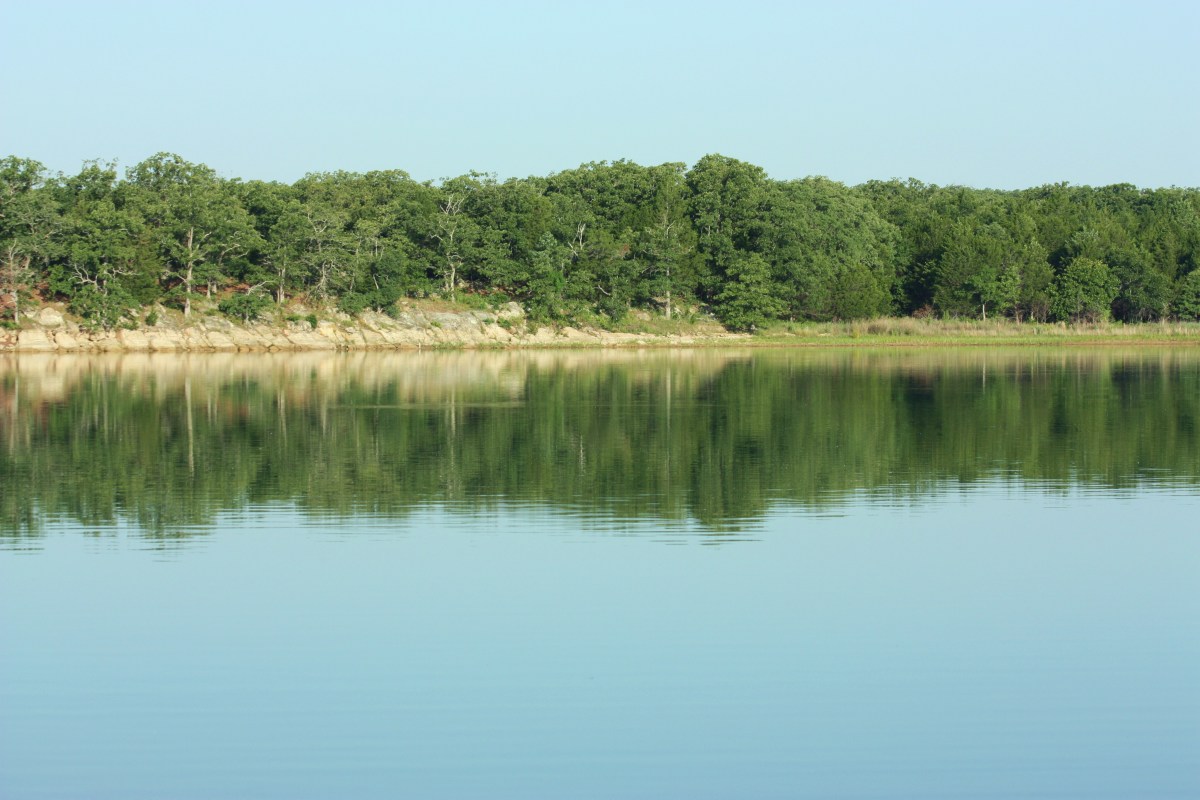The reflection of the shores on Lake Murray. 