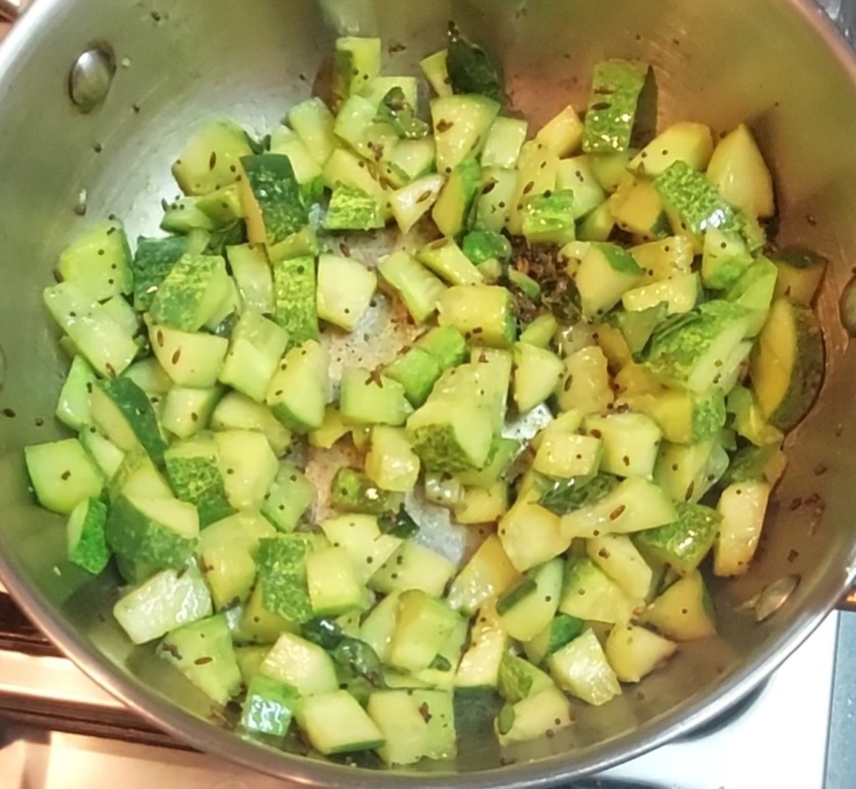 Saute well for 1-2 minutes (cucumber starts to shrink). Add salt to taste.